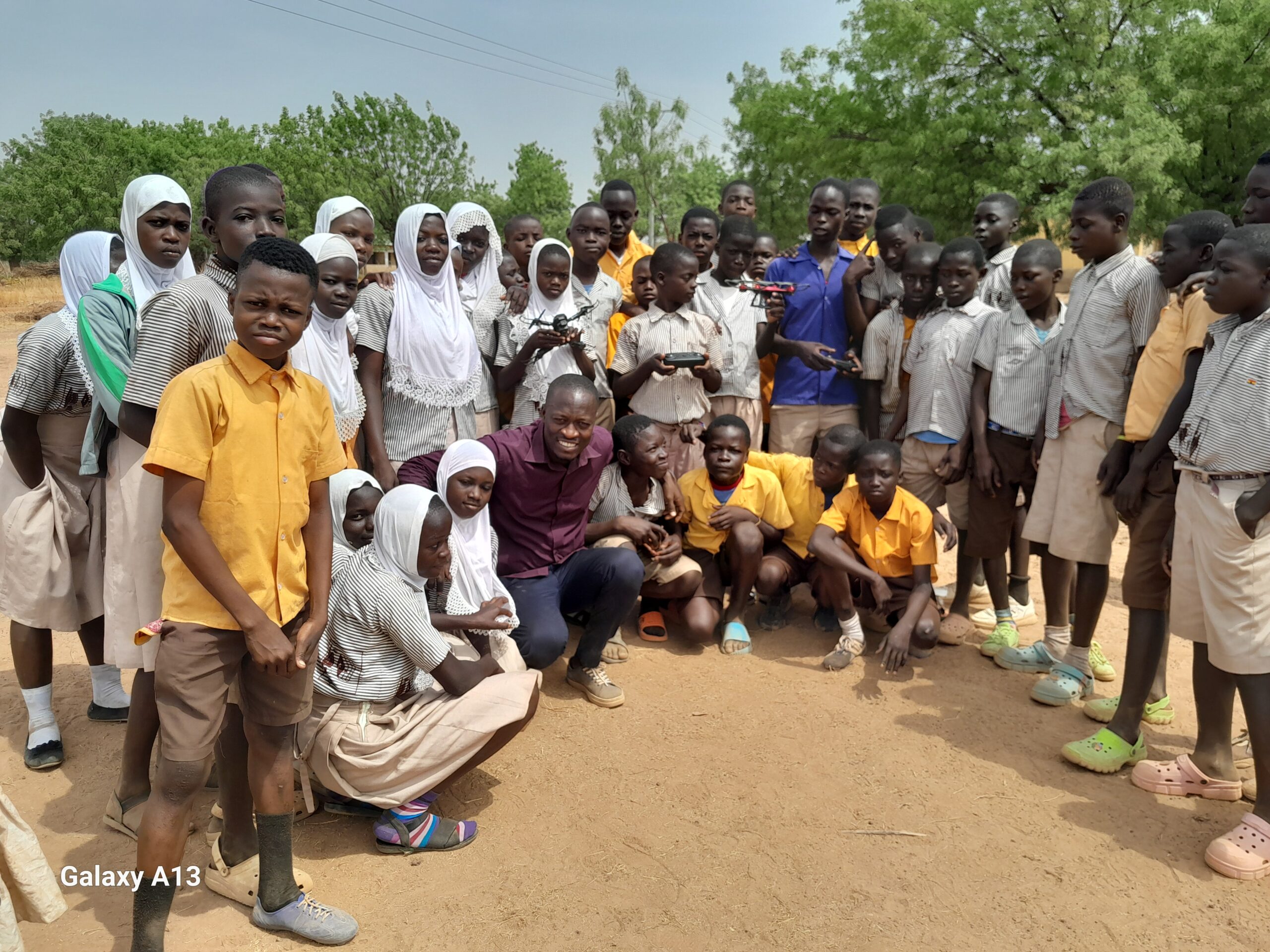 group of school kids with their teacher